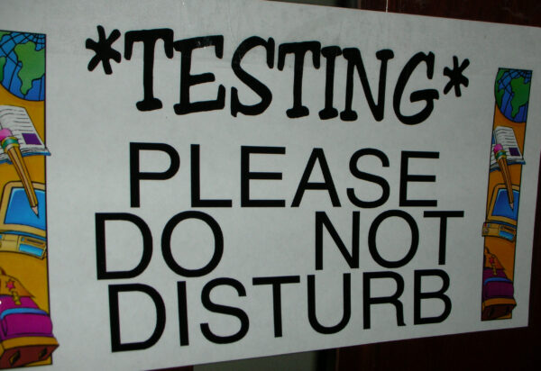 Testing sign that reads: TESTING please do not disturb